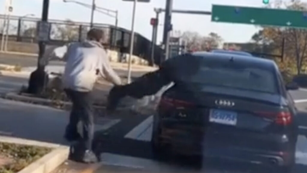 Homeless Man Smashes Audi Window
