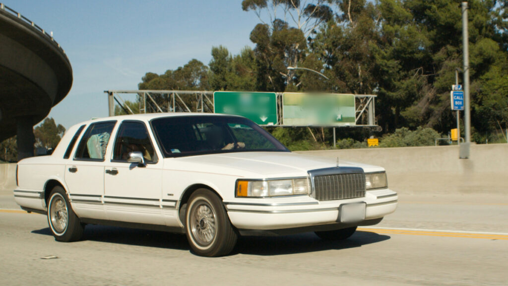 Lincoln Town Car on Highway